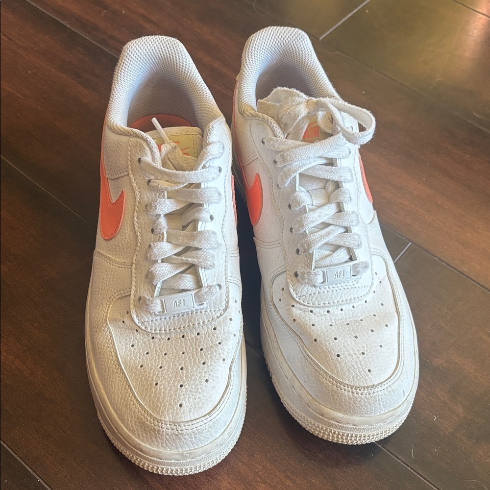 Nike Air Force 1 White with Orange Swoosh
Size women’s 7.5
